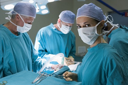 Four Surgeons Getting Ready To Operating On A Patient